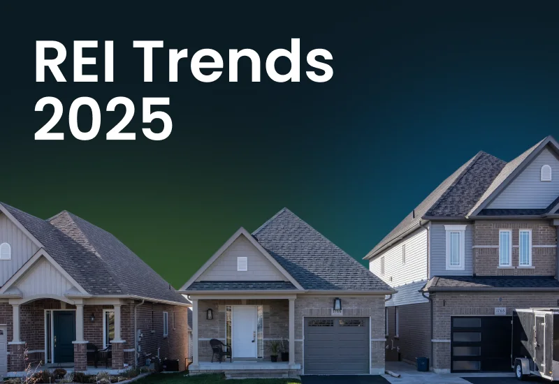 A row of new suburban houses under a dark blue and green sky, with the words REI Trends 2025 across it