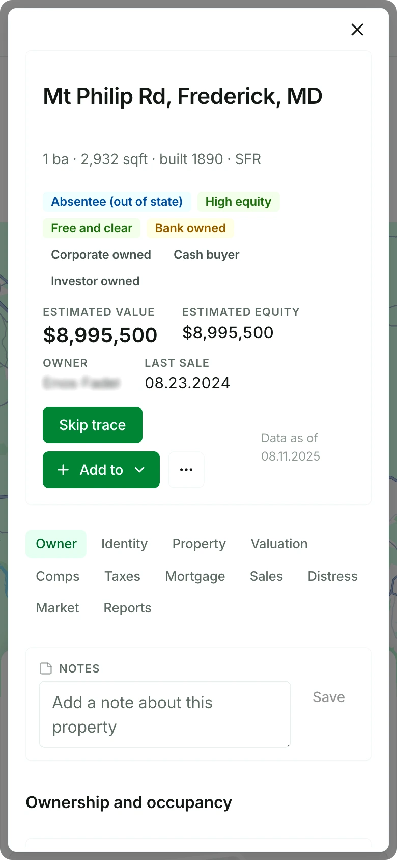 A property record open in a phone browser: the street address, the size and the year it was built, badges for absentee owner, high equity, free and clear and bank owned, the estimated value beside the estimated equity, and the Skip trace and Add to buttons under them